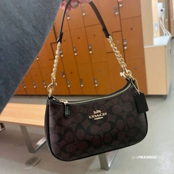 First-quality Coach Teri Sling Shoulder Bag made of premium leather with adjustable strap and elegant gold-tone accents, perfect for everyday use